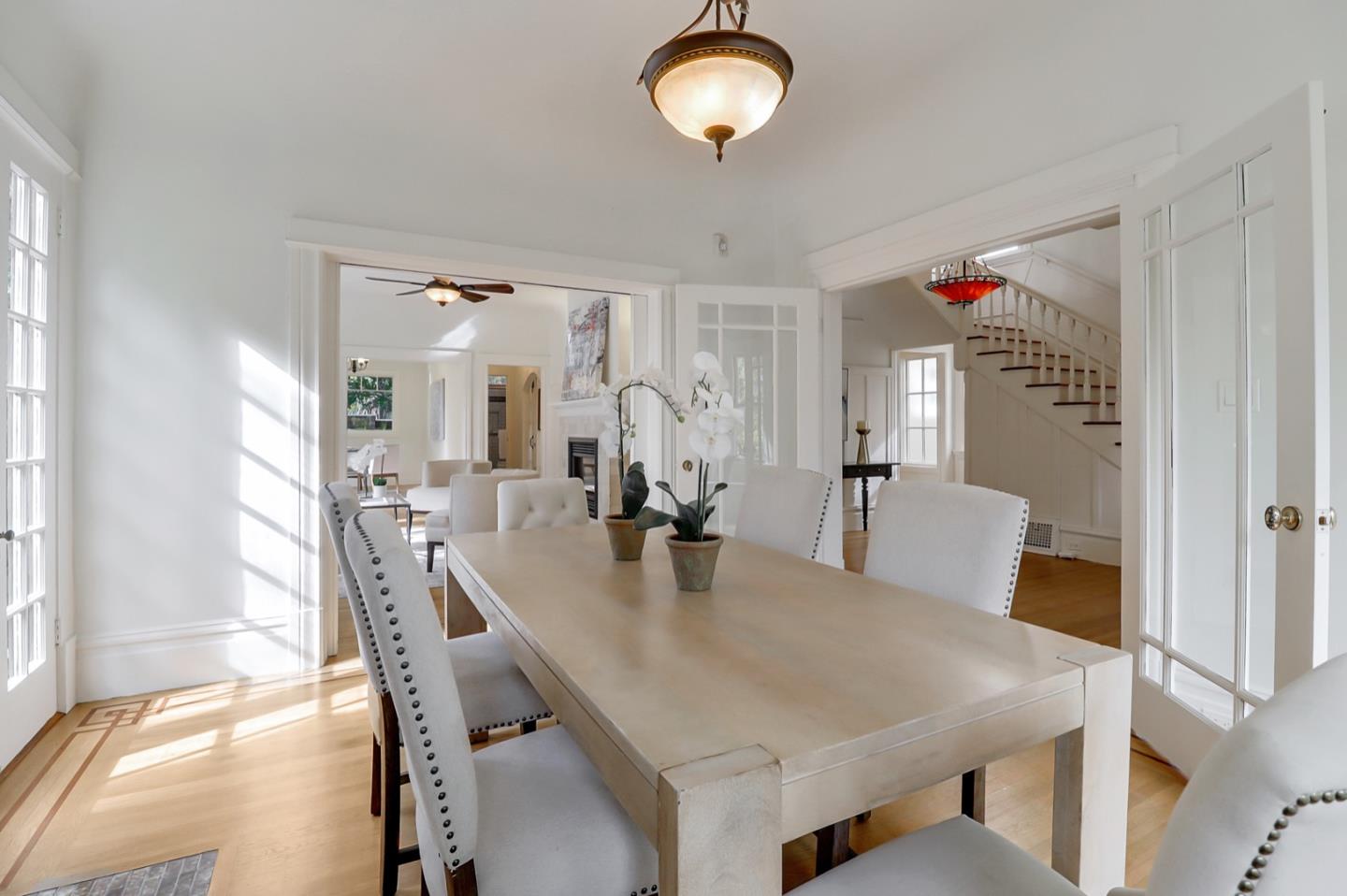 2614 Etna Street Berkeley, CA 94704 - Photo 14 of 59 a view of a dining room with furniture and a chandelier