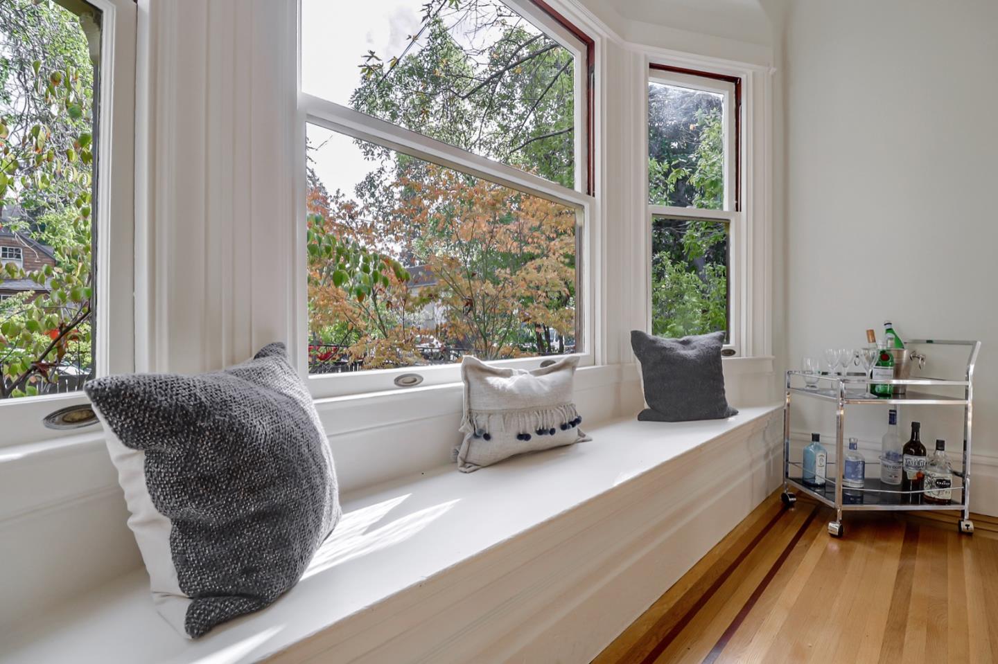 2614 Etna Street Berkeley, CA 94704 - Photo 16 of 59 a living room with furniture and a large window