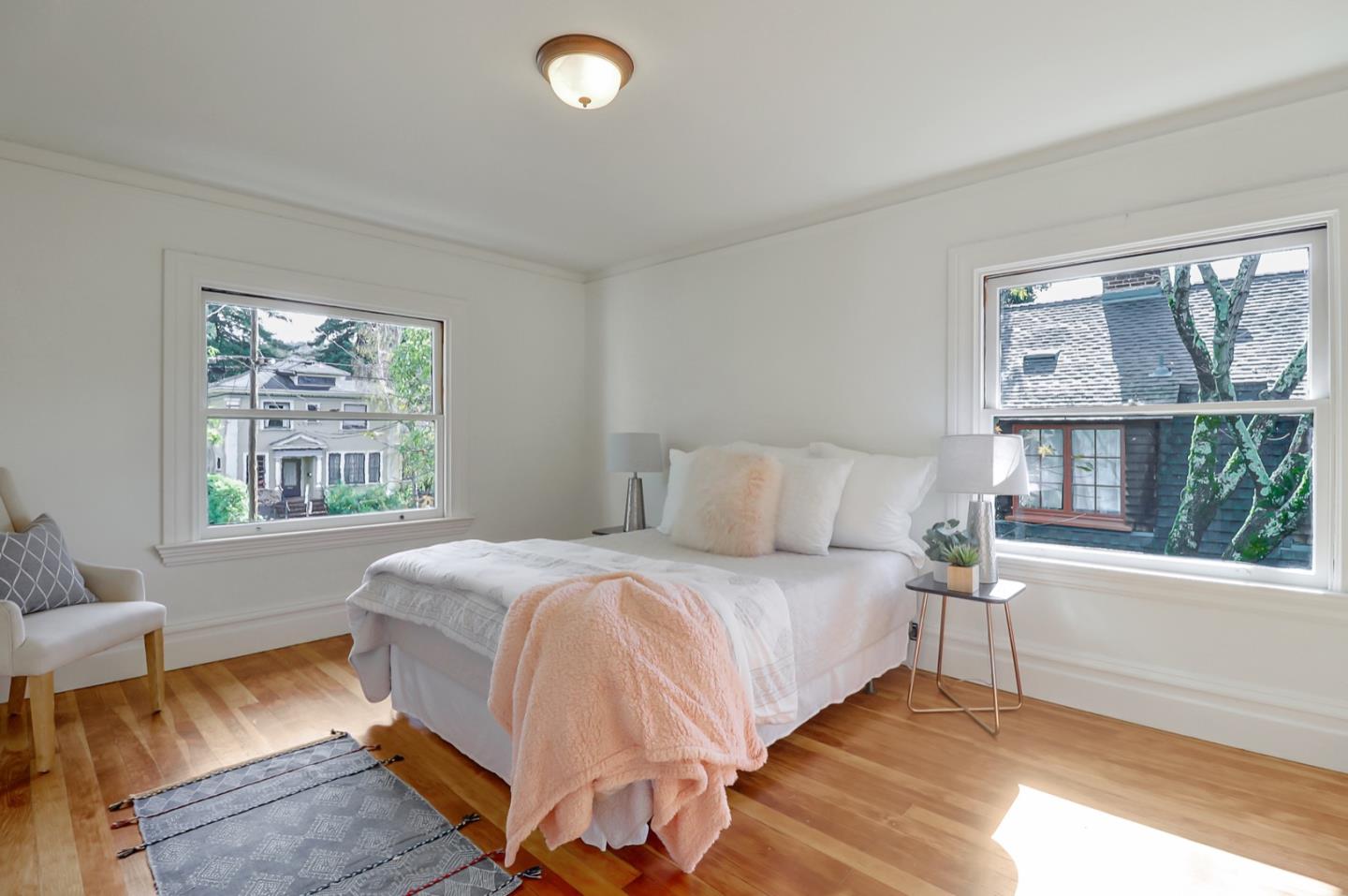 2614 Etna Street Berkeley, CA 94704 - Photo 28 of 59 a bedroom with a bed and a large window