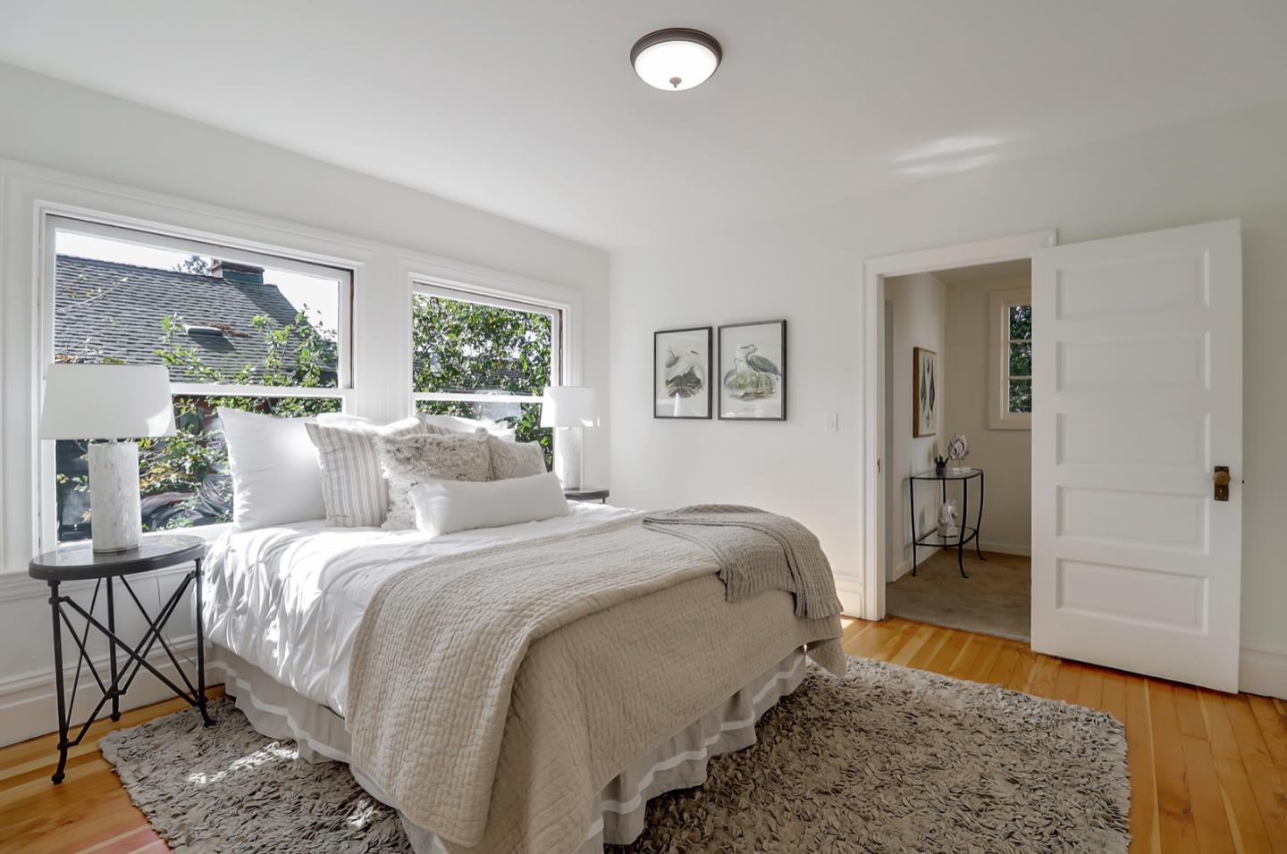 2614 Etna Street Berkeley, CA 94704 - Photo 29 of 59 a bedroom with a bed and a couch