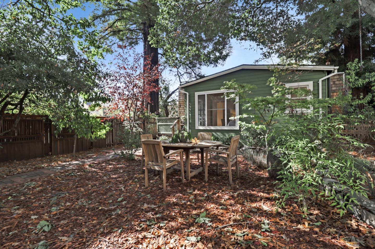 2614 Etna Street Berkeley, CA 94704 - Photo 38 of 59 a backyard of a house with table and chairs