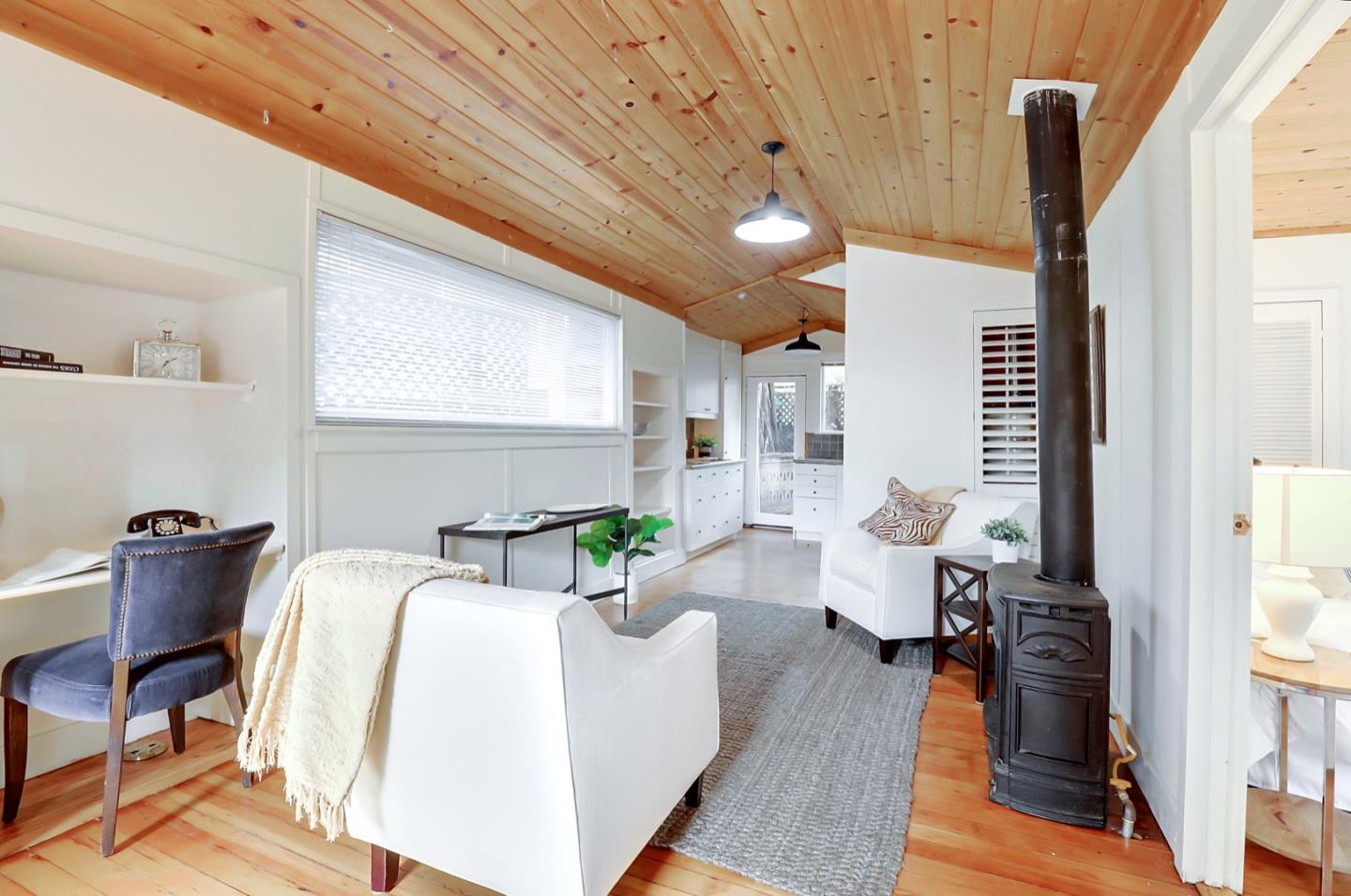 2614 Etna Street Berkeley, CA 94704 - Photo 43 of 59 a living room with furniture and wooden floor