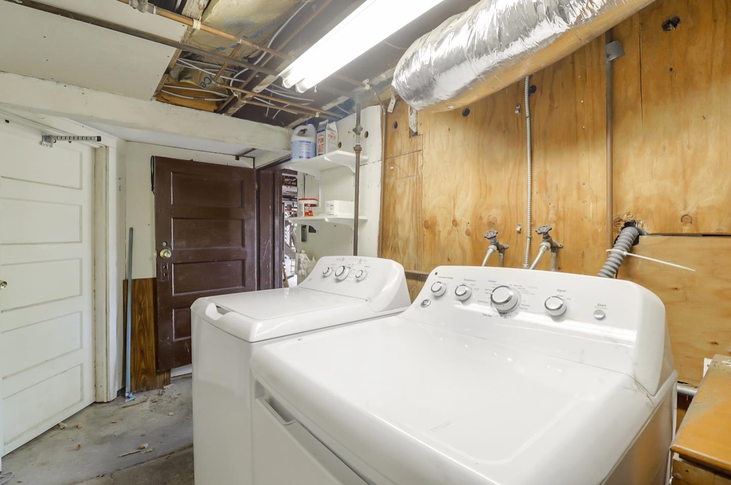 2614 Etna Street Berkeley, CA 94704 - Photo 49 of 59 a utility room with dryer and washer
