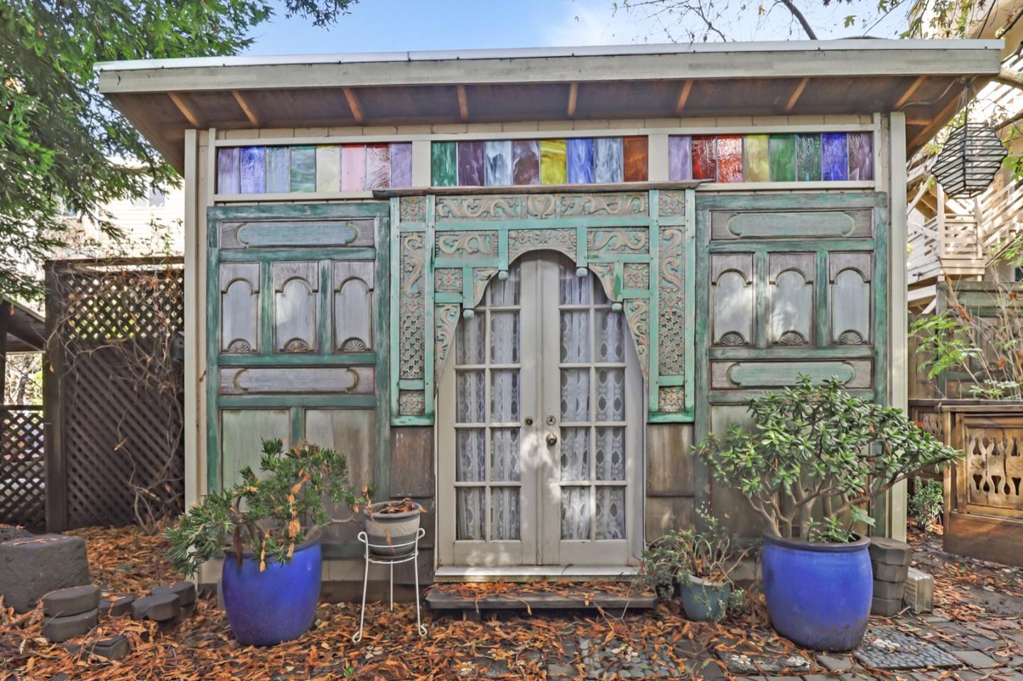 2614 Etna Street Berkeley, CA 94704 - Photo 51 of 59 a front view of a house with outdoor seating and plants