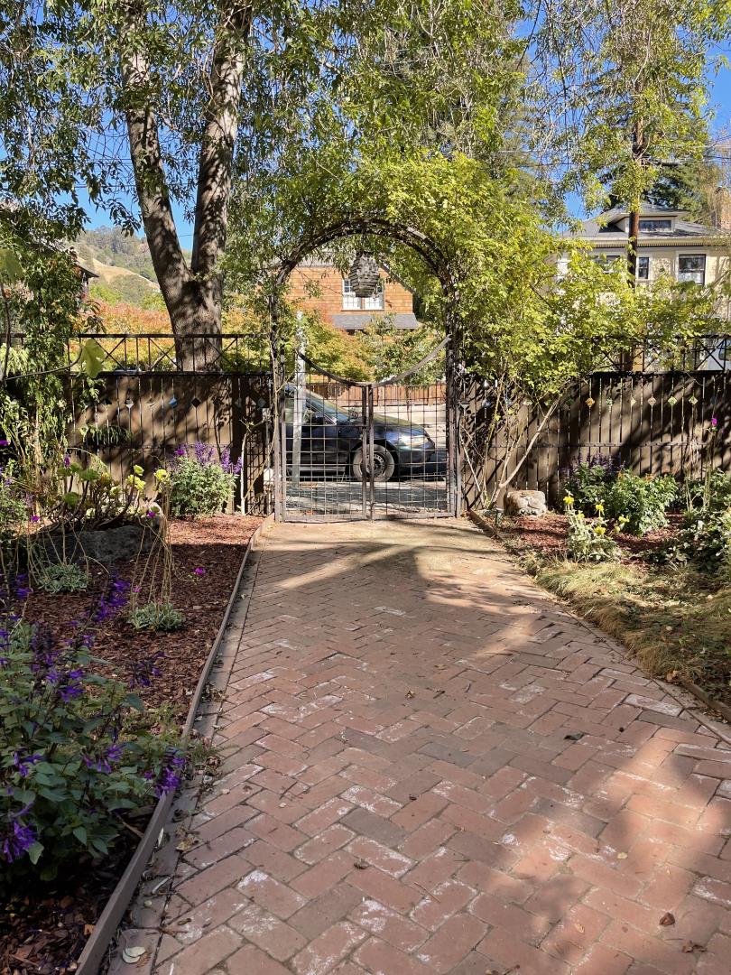 2614 Etna Street Berkeley, CA 94704 - Photo 56 of 59 a view of a patio with table and chairs and potted plants