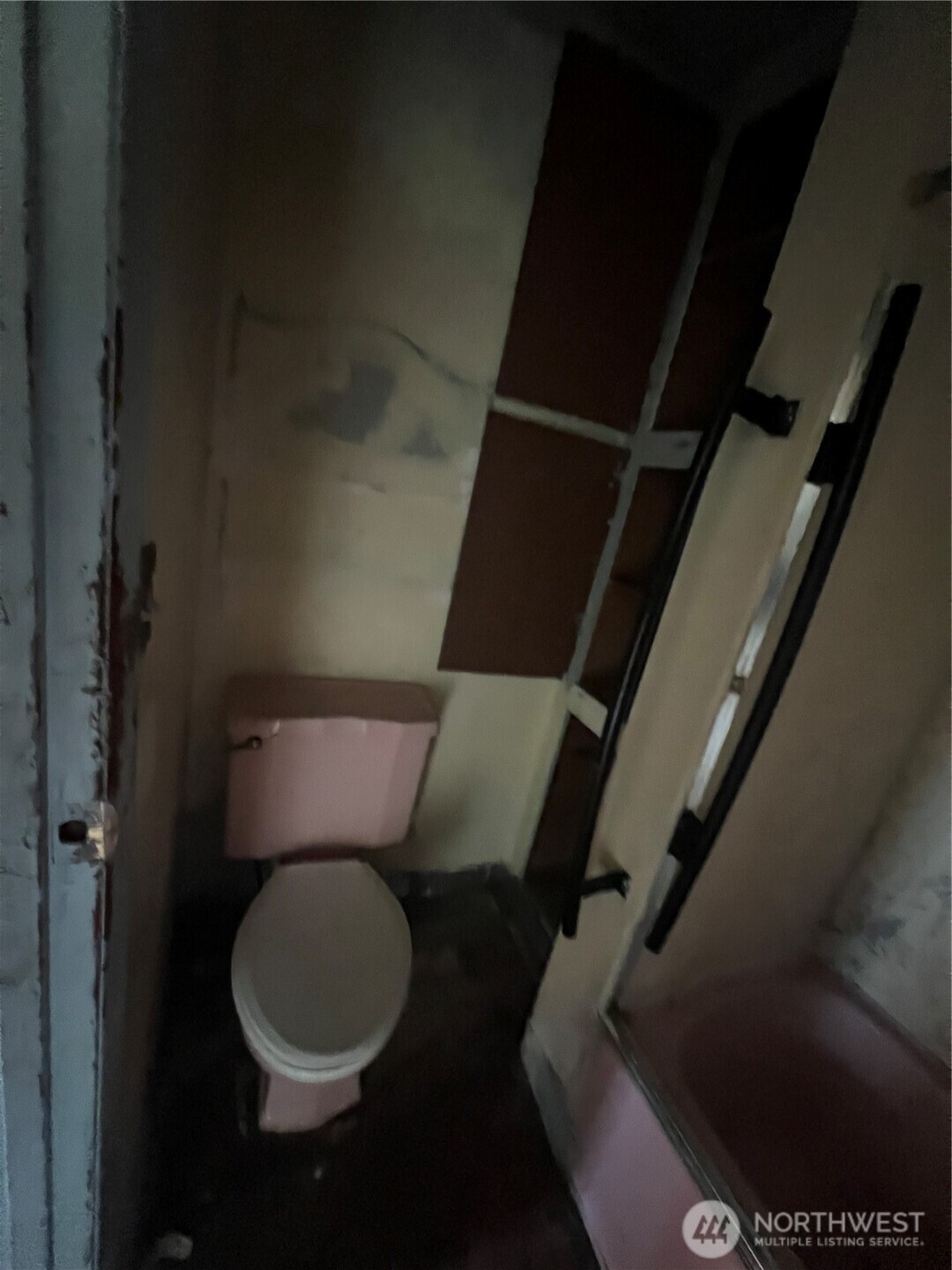 131 17th Avenue Longview, WA 98632 - Photo 22 of 38 a toilet sitting in a bathroom next to a sink
