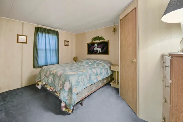 a bathroom with a sink toilet and a shower