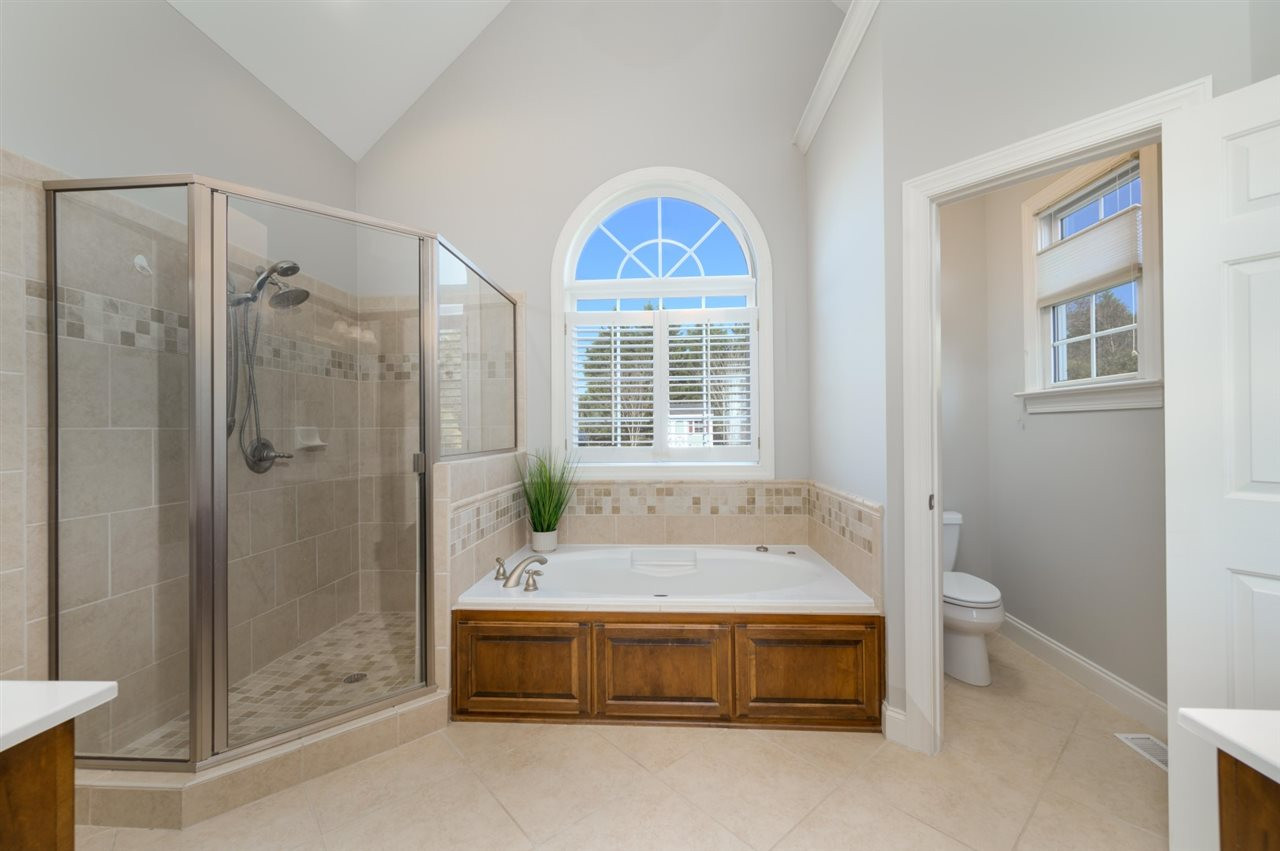 2116 Conroy Way Willow Spring, NC 27592 - Photo 13 of 26 Relax and unwind in this spacious bathroom. Master Bath/Spa