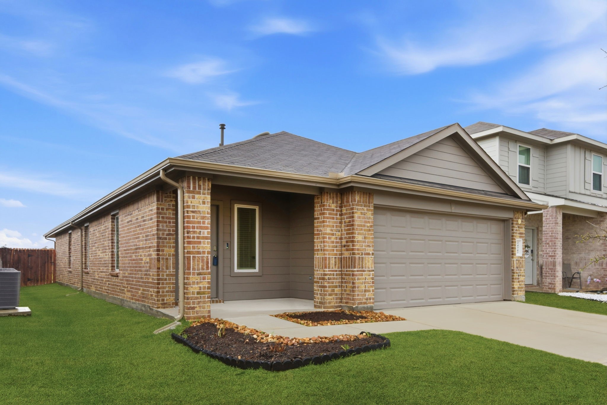 24343 Saddlestone Green Drive Spring, TX 77373 - Photo 2 of 43 a front view of a house with a yard