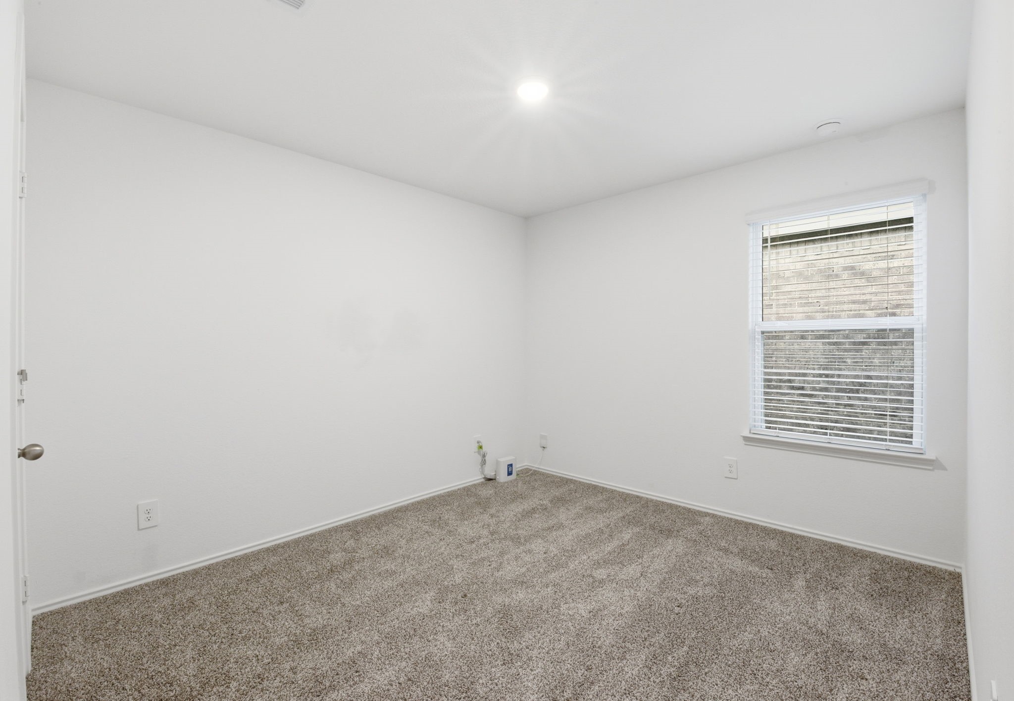 24343 Saddlestone Green Drive Spring, TX 77373 - Photo 32 of 43 an empty room with a window