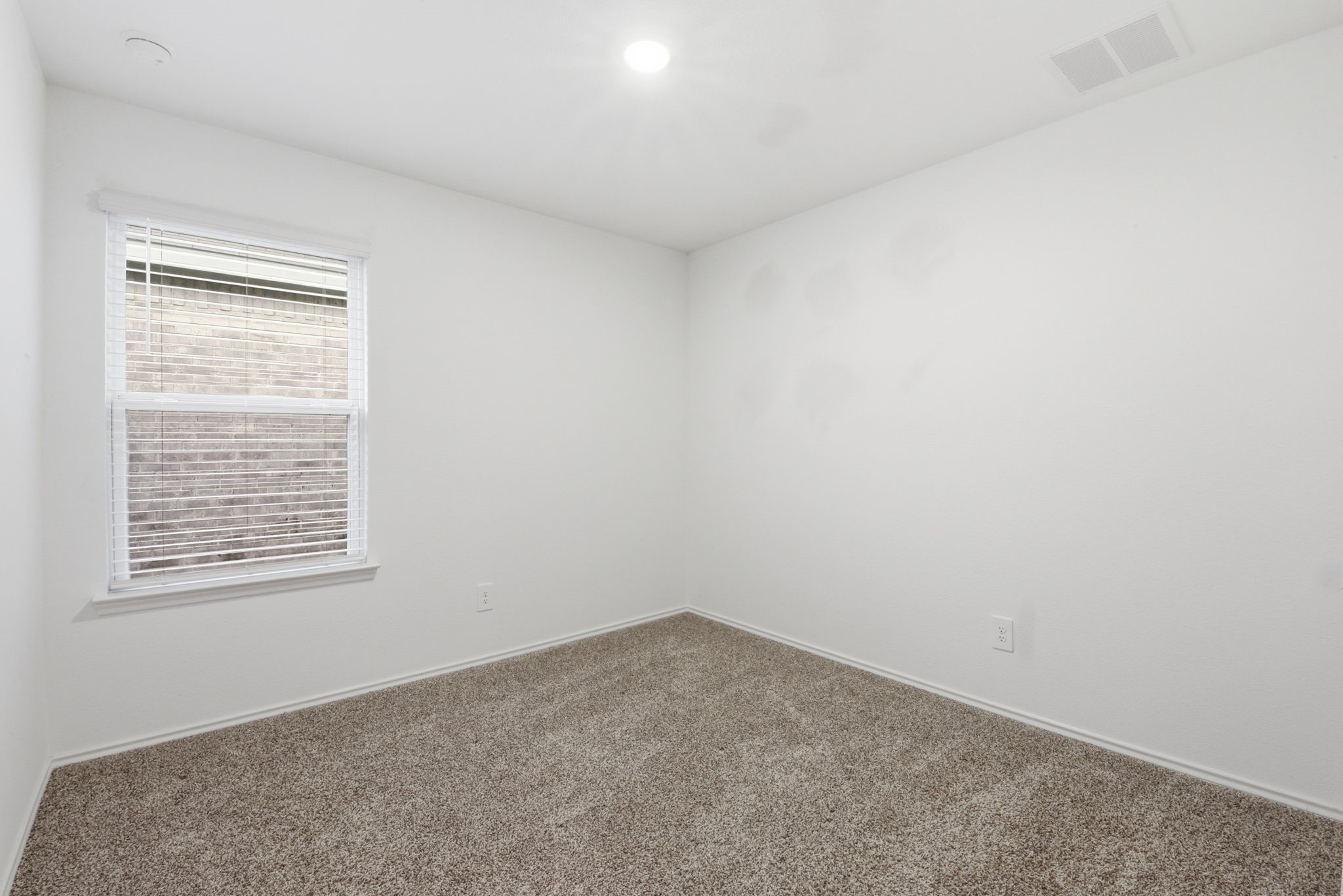 24343 Saddlestone Green Drive Spring, TX 77373 - Photo 35 of 43 an empty room with a window