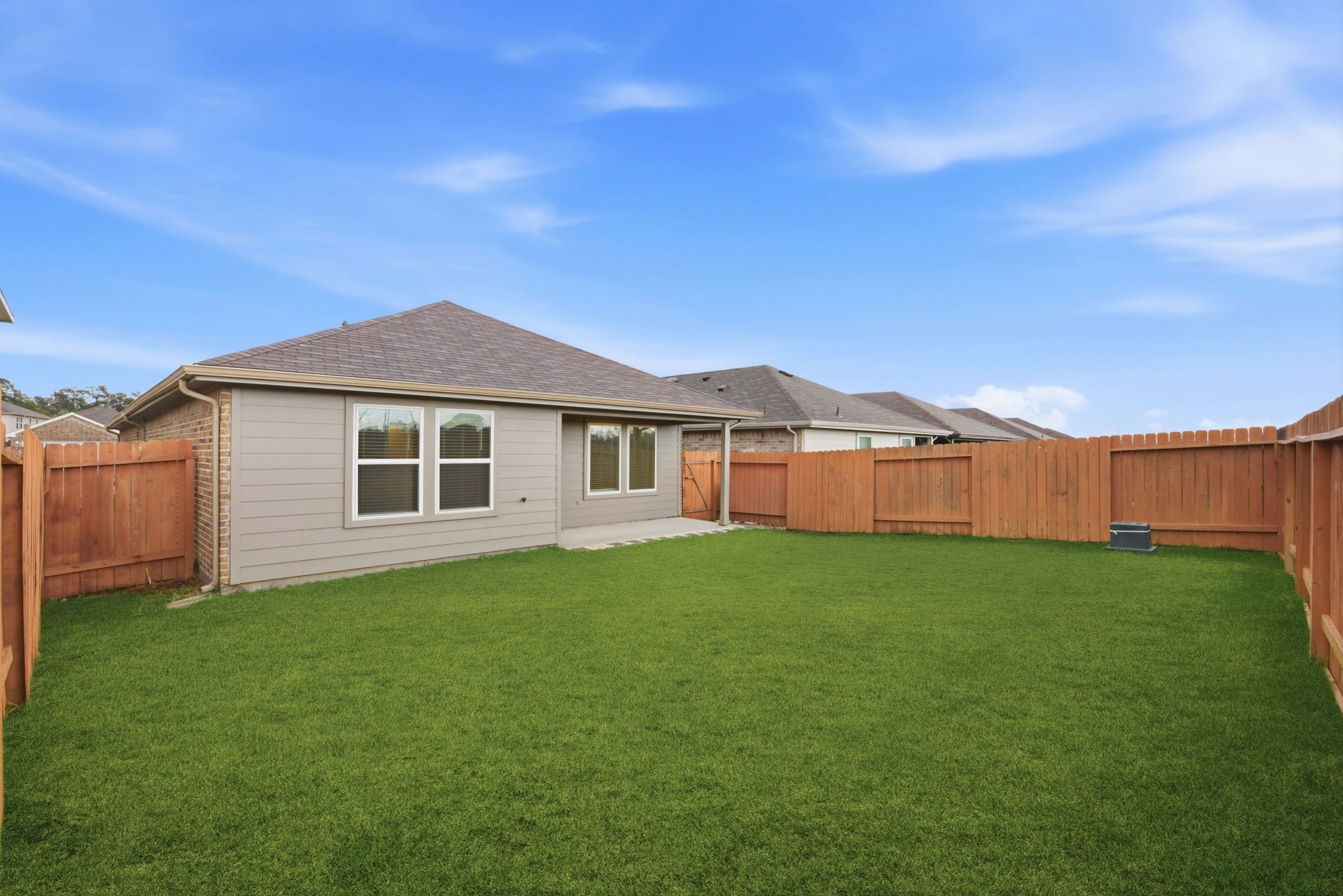 24343 Saddlestone Green Drive Spring, TX 77373 - Photo 42 of 43 a view of a yard with a house in the background