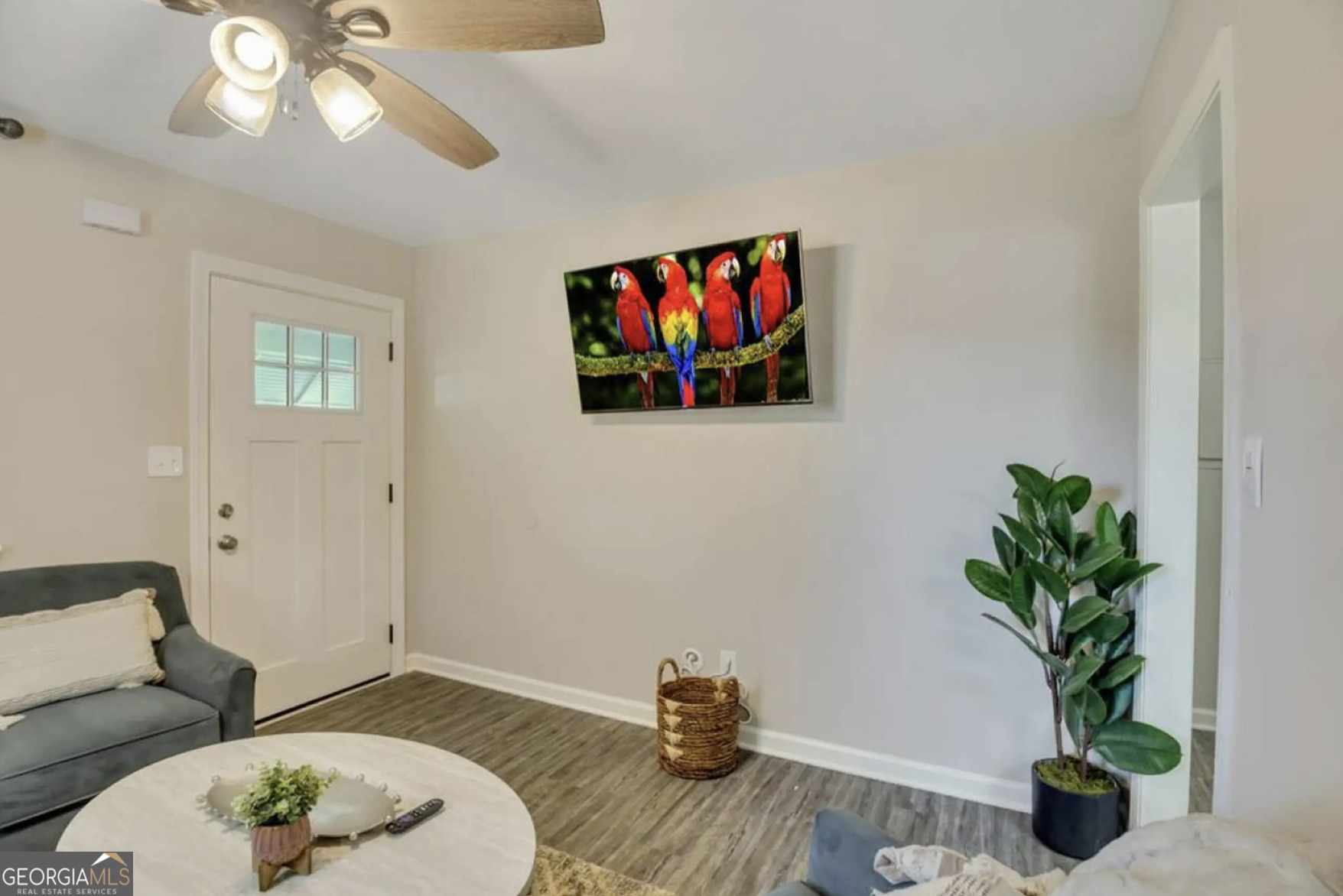 50 Oak Street Hiram, GA 30141 - Photo 3 of 16 a living room with furniture and a potted plant