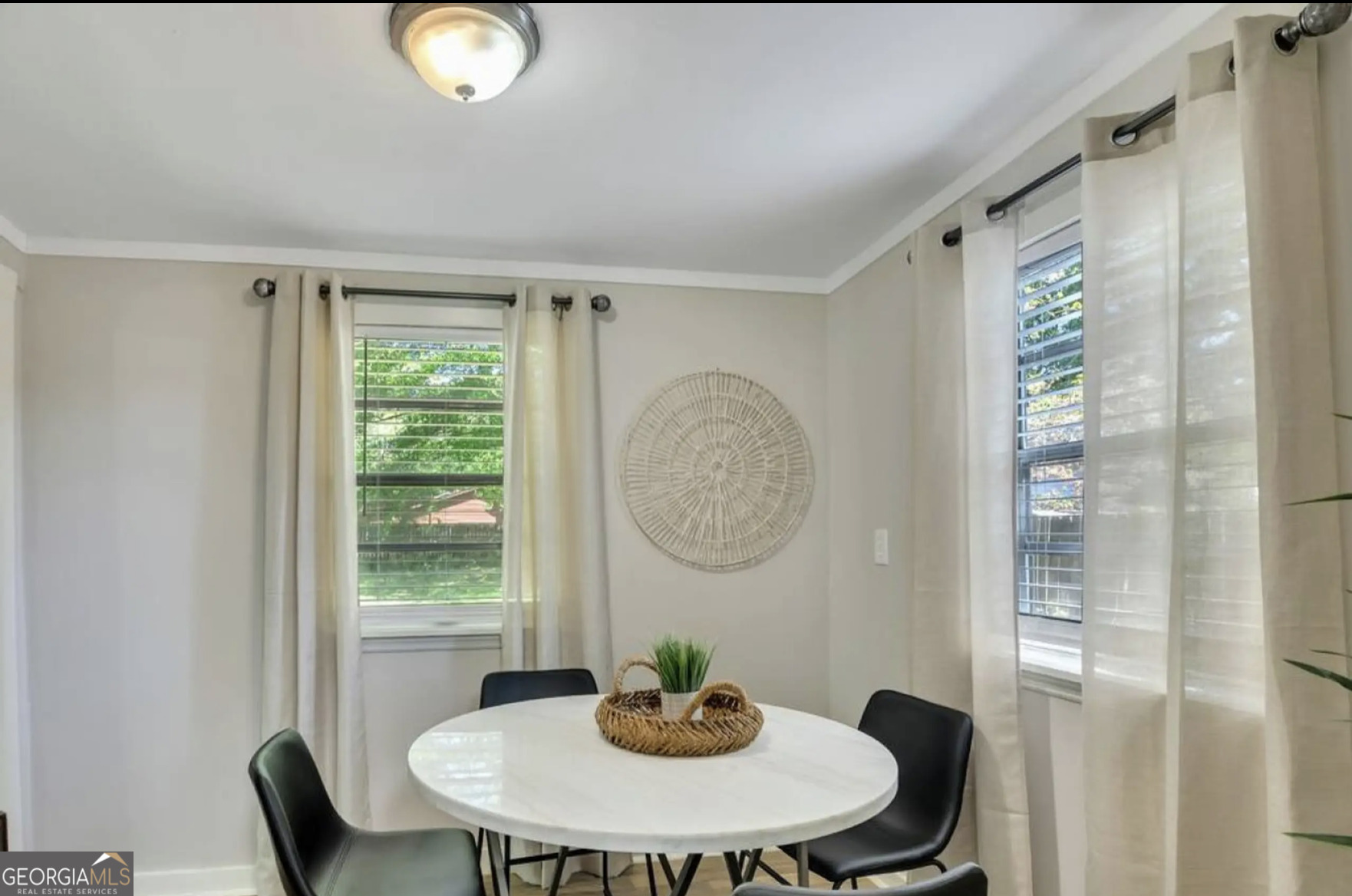 50 Oak Street Hiram, GA 30141 - Photo 8 of 16 a dining room with furniture and a mirror