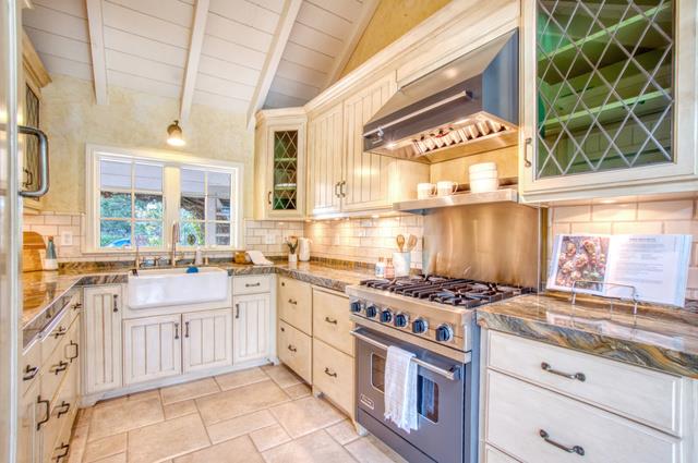 655 Bayview Drive Aptos, CA 95003 - Photo 14 of 48 a kitchen with stainless steel appliances a stove a sink and a cabinets