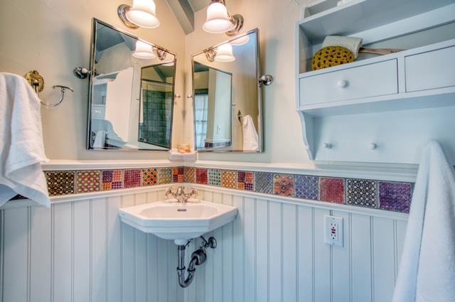 655 Bayview Drive Aptos, CA 95003 - Photo 21 of 48 a bathroom with a sink and a mirror