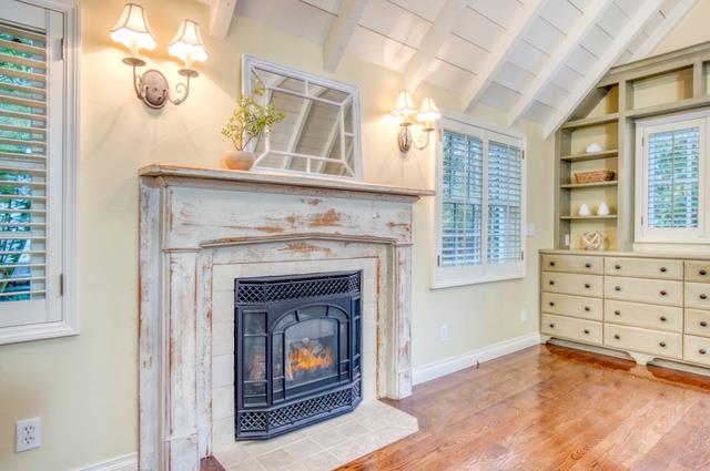 655 Bayview Drive Aptos, CA 95003 - Photo 32 of 48 a living room with furniture and a fireplace