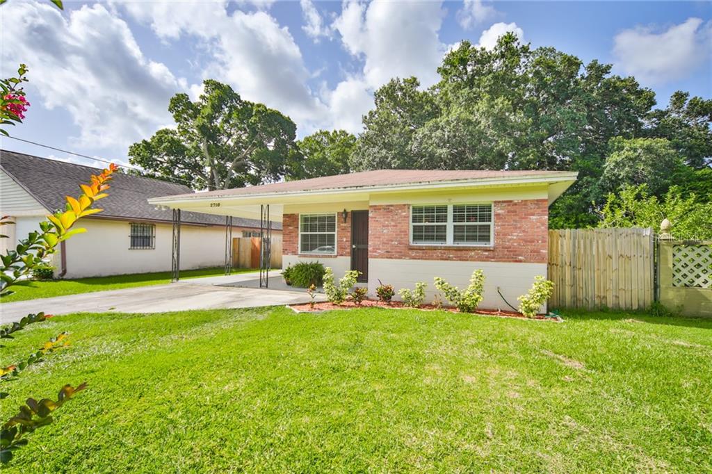 2710 West Collins Street Tampa, FL 33607 - Photo 1 of 1 a view of a house with a yard and sitting area