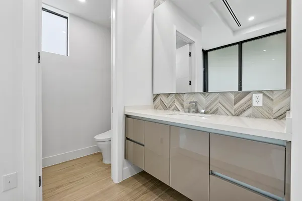 a kitchen with a sink and a window