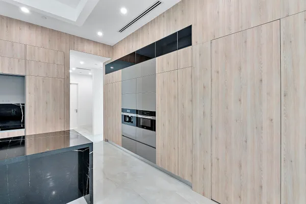 a utility room with sink dryer and washer