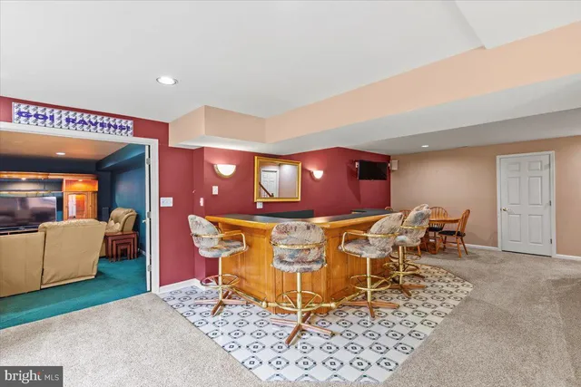 a living room with furniture and a table