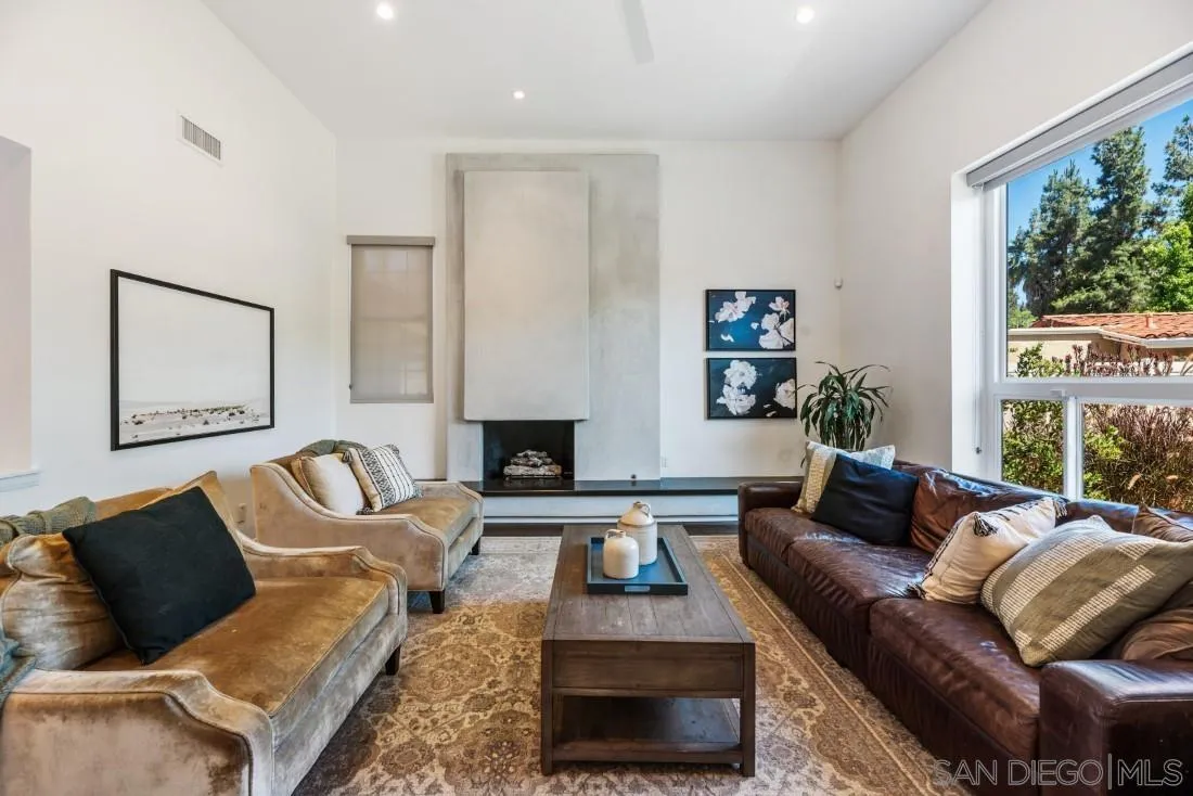 13060 Camino Del Valle Poway, CA 92064 - Photo 12 of 75 a living room with furniture fireplace and a large window
