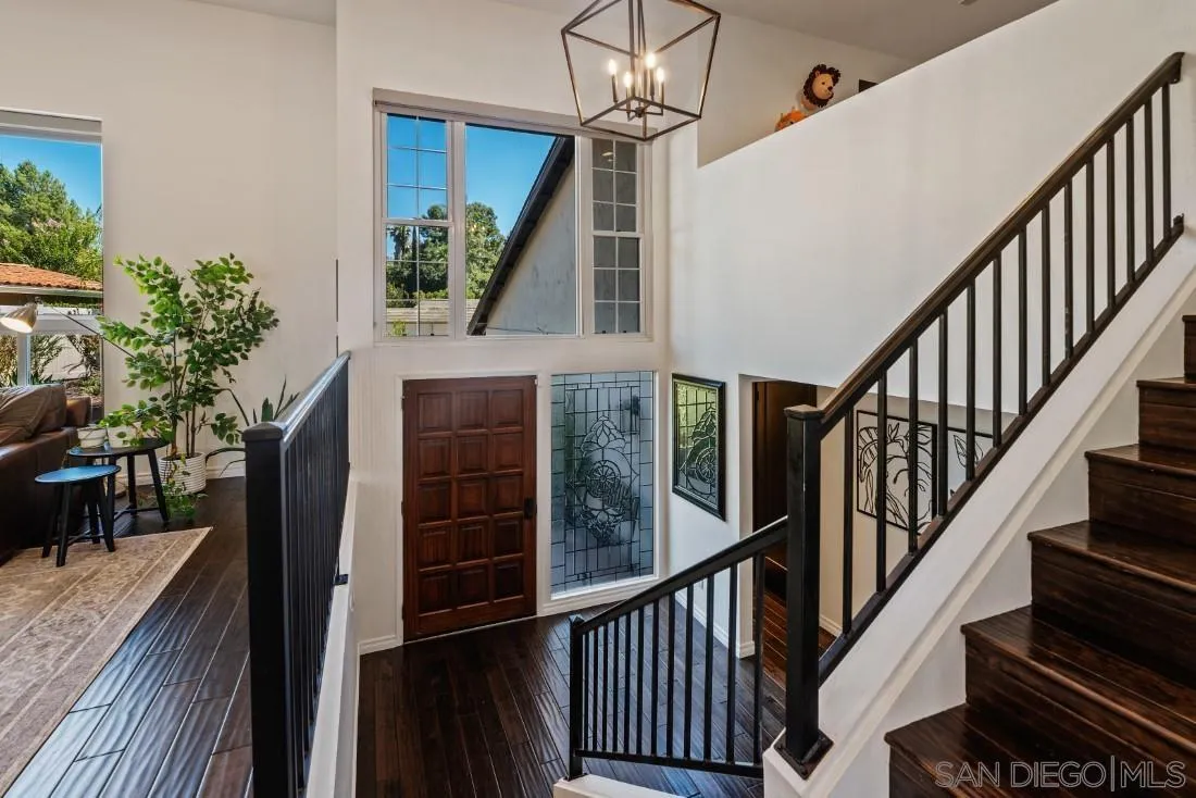 13060 Camino Del Valle Poway, CA 92064 - Photo 35 of 75 a view of entryway and hall with wooden floor