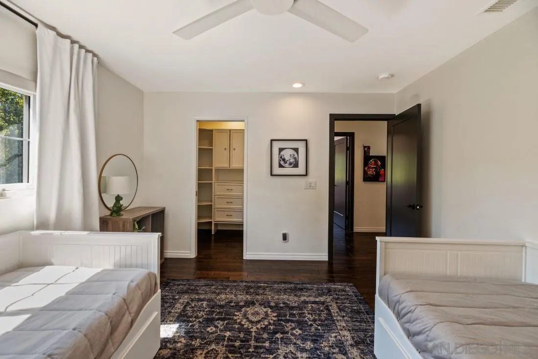 13060 Camino Del Valle Poway, CA 92064 - Photo 37 of 75 a bedroom with a large bed and a large window