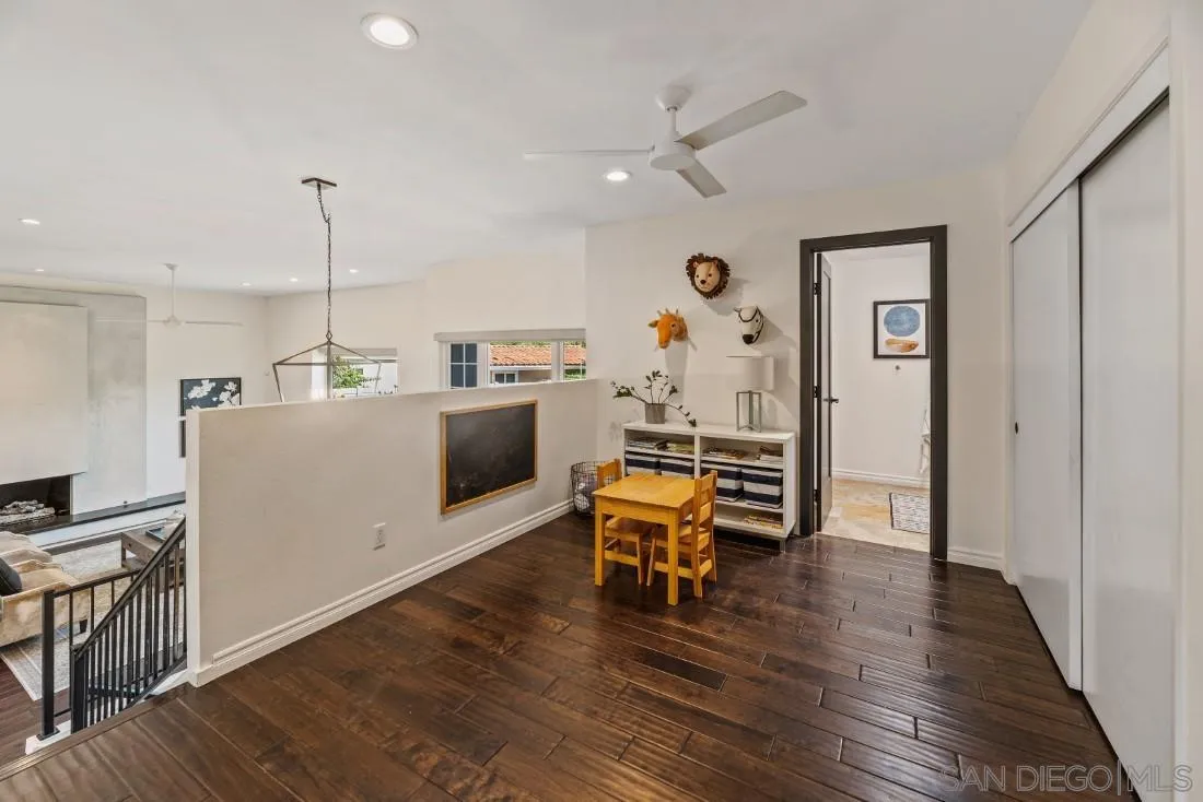 13060 Camino Del Valle Poway, CA 92064 - Photo 40 of 75 a room with furniture and a wooden floor