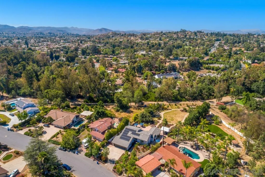 13060 Camino Del Valle Poway, CA 92064 - Photo 70 of 75 an aerial view of residential houses with outdoor space and trees