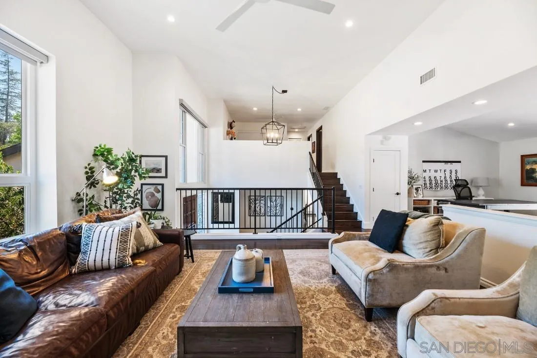 13060 Camino Del Valle Poway, CA 92064 - Photo 10 of 75 a living room with furniture staircase and a large window