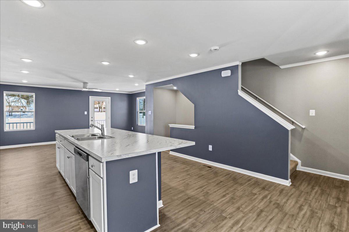46 Scoter Road Hedgesville, WV 25427 - Photo 11 of 28 a kitchen with a sink and stove