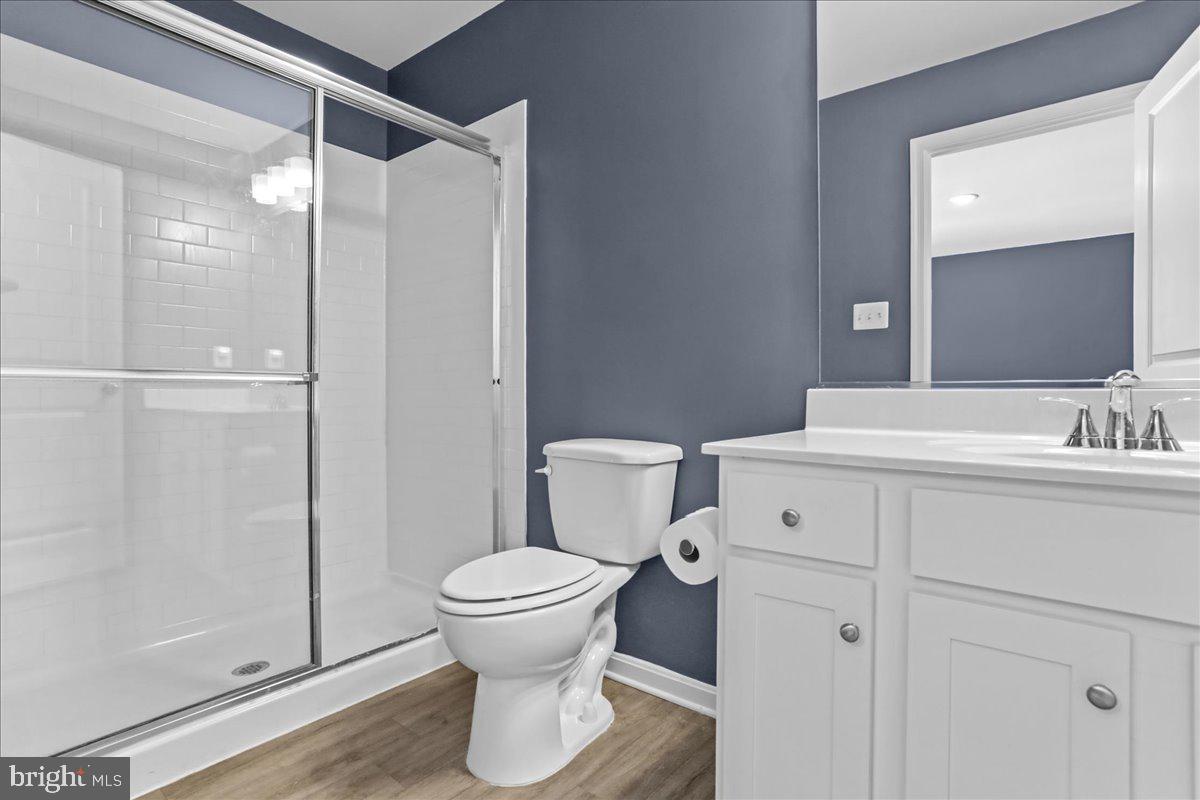 46 Scoter Road Hedgesville, WV 25427 - Photo 20 of 28 a bathroom with a sink toilet and shower