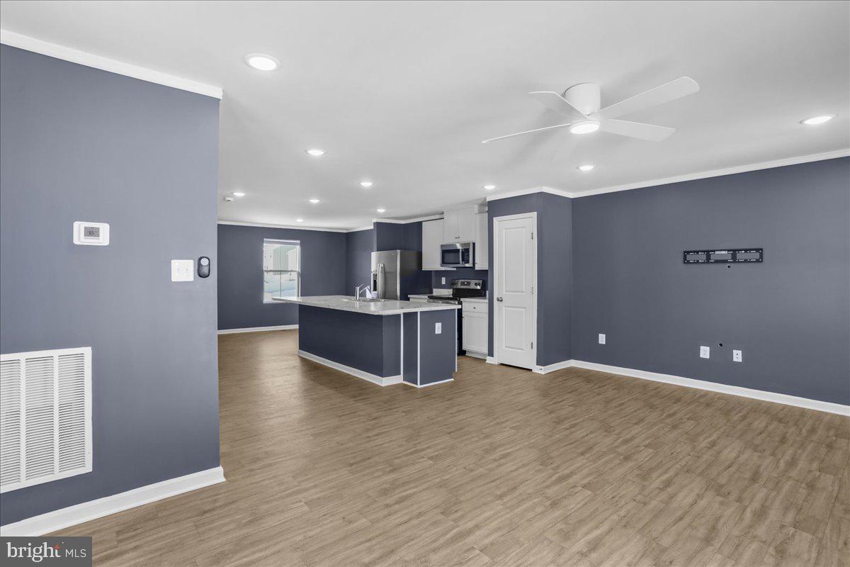 46 Scoter Road Hedgesville, WV 25427 - Photo 9 of 28 a view of kitchen with kitchen island and stainless steel appliances