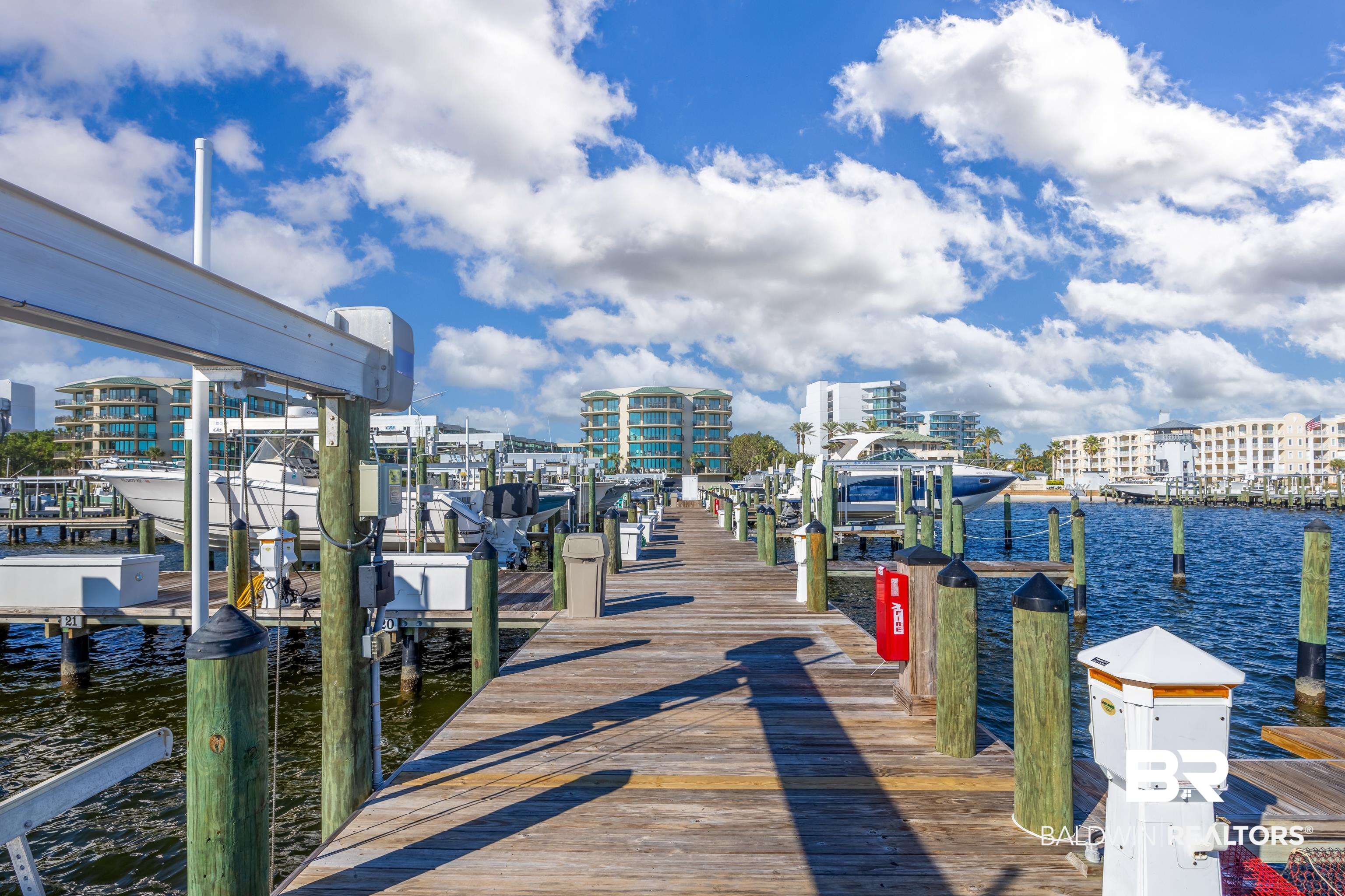 27580 Canal Road, Unit 1431 Orange Beach, AL 36561 - Photo 61 of 73 Dock area with a water view and boat lift