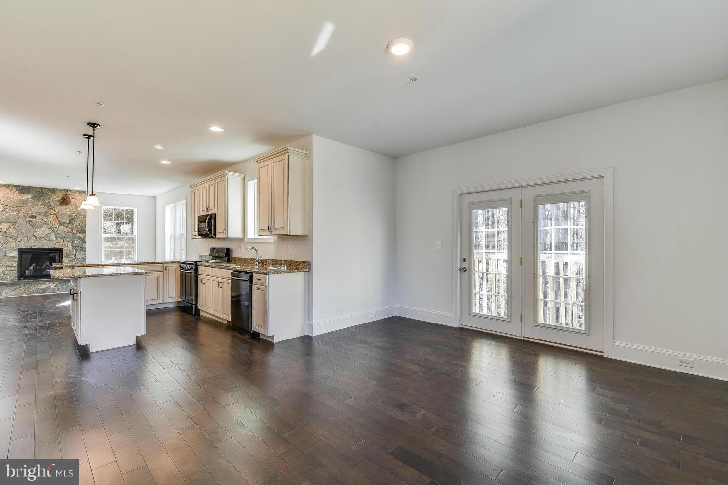 3526 Kemptown Church Road Monrovia, MD 21770 - Photo 13 of 29 a view of kitchen with stove and wooden floor