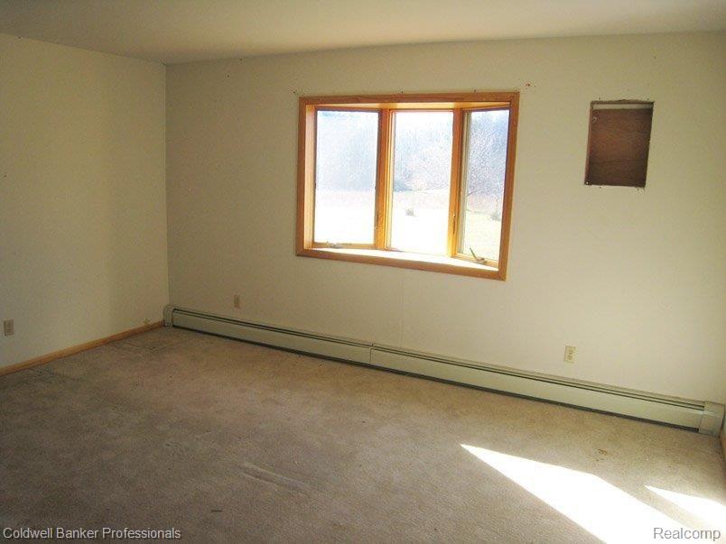 2879 Klam Road Lapeer, MI 48446 - Photo 5 of 11 Sunny and Bright Bedroom