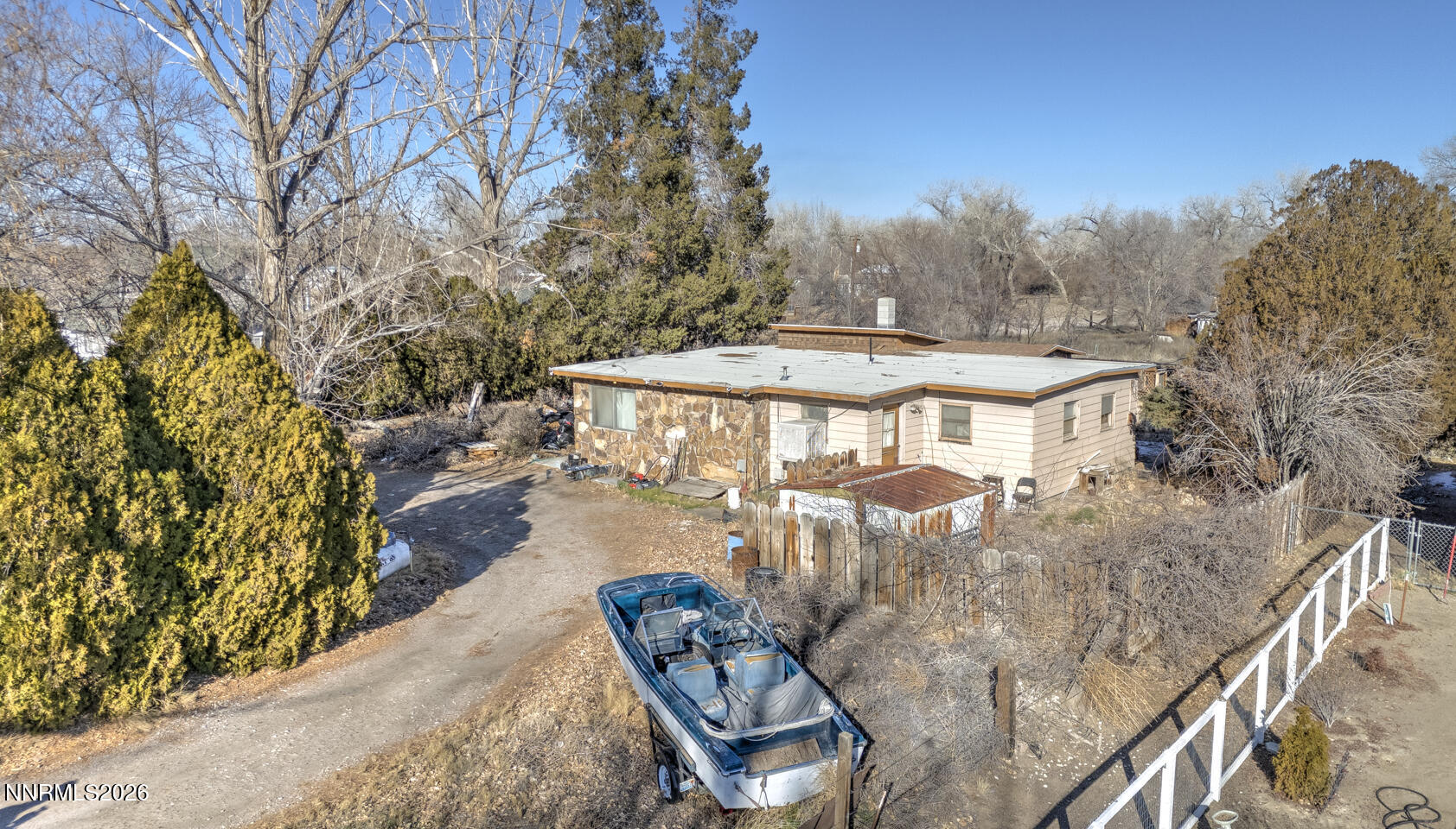 3780 Alcorn Road Fallon, NV 89406 - Photo 2 of 11 a view of a patio with furniture and a yard