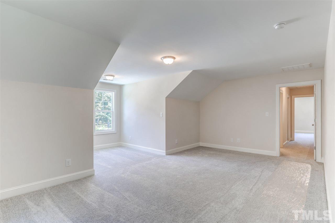 2305 Pilot-Riley Road Zebulon, NC 27597 - Photo 14 of 20 an empty room with windows