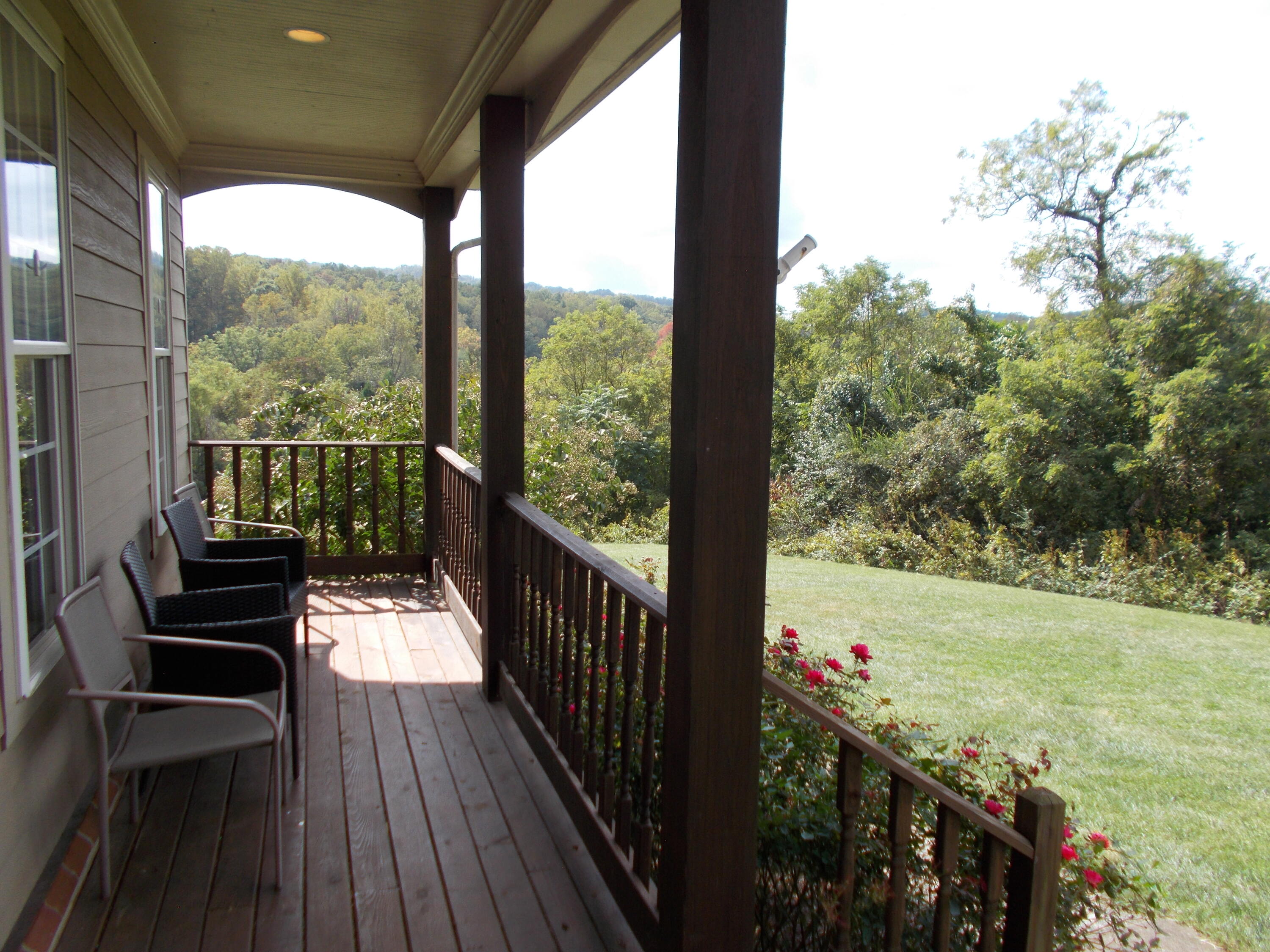 4420 Bethlehem Road Boones Mill, VA 24065 - Photo 3 of 43 a view of a balcony with wooden floor