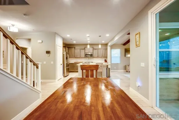 a livingroom with furniture and a flat screen tv
