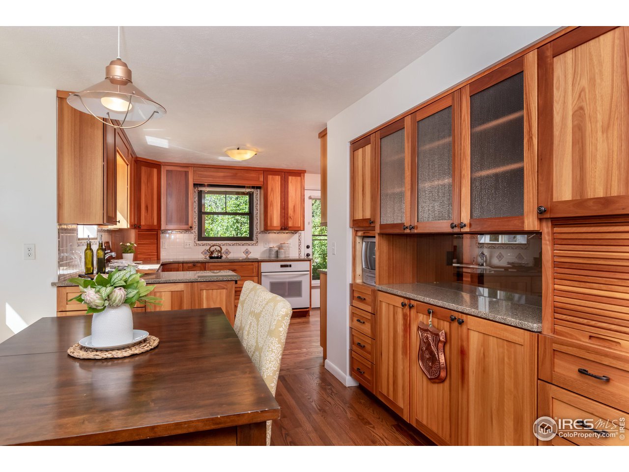 375 16th Street Boulder, CO 80302 - Photo 11 of 30 a open kitchen with stainless steel appliances granite countertop a granite counter tops and a view of living room