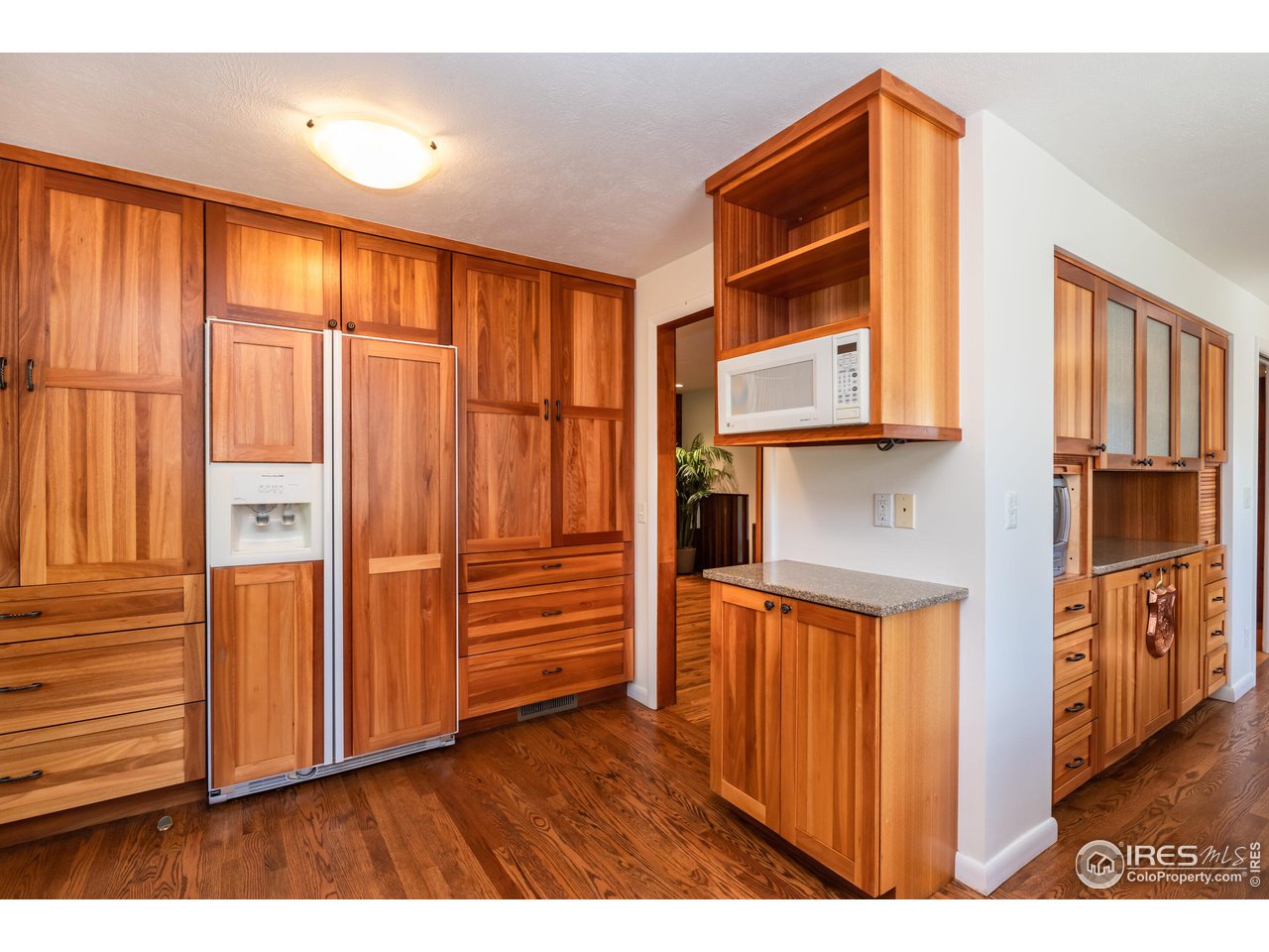 375 16th Street Boulder, CO 80302 - Photo 12 of 30 a view of a kitchen with furniture and wooden floor