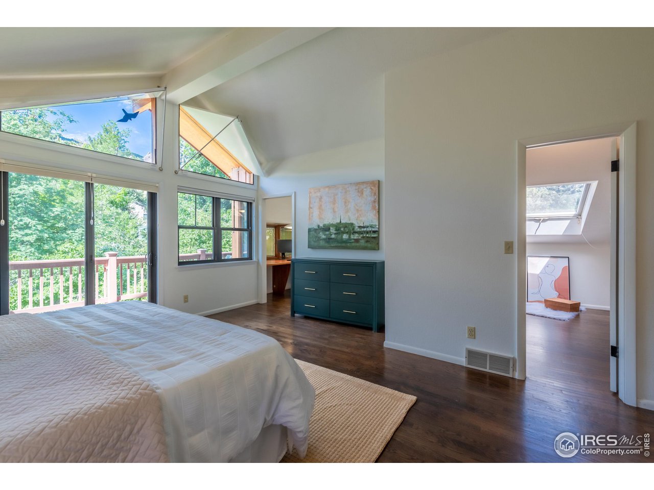 375 16th Street Boulder, CO 80302 - Photo 14 of 30 a bedroom with a bed and a large window