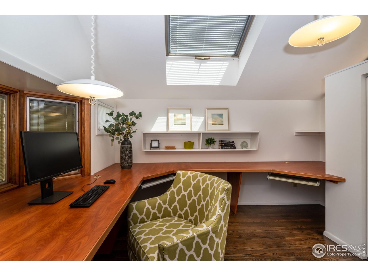 375 16th Street Boulder, CO 80302 - Photo 16 of 30 a living room with furniture and a flat screen tv