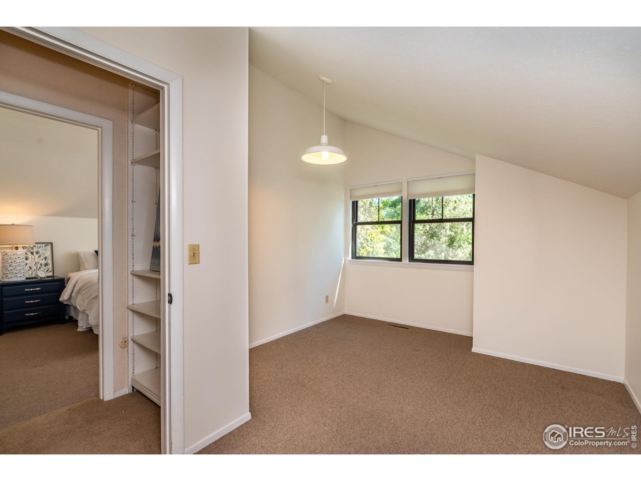 375 16th Street Boulder, CO 80302 - Photo 22 of 30 a view of an empty room and a window