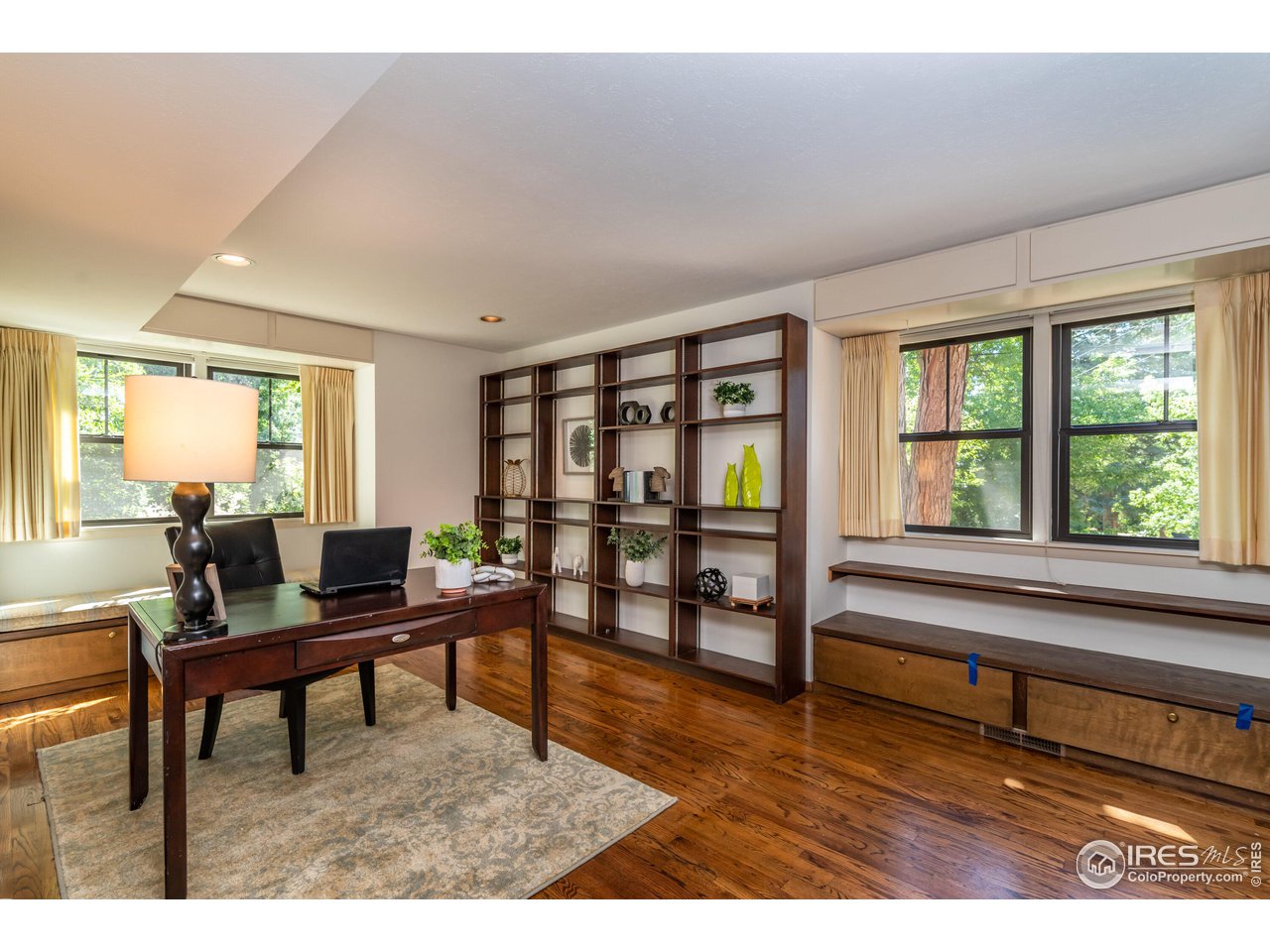 375 16th Street Boulder, CO 80302 - Photo 7 of 30 a living room with furniture and a window