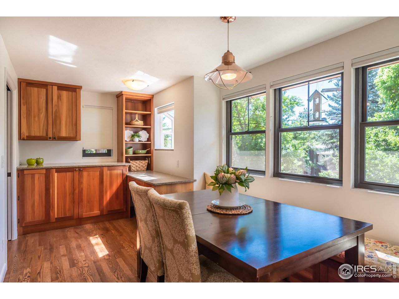 375 16th Street Boulder, CO 80302 - Photo 10 of 30 a view of a dining room with furniture window and outside view
