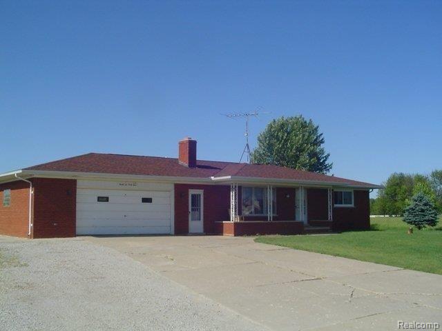 9244 Yager Road Goodells, MI 48027 - Photo 1 of 10 Front of home on 6.63 acres