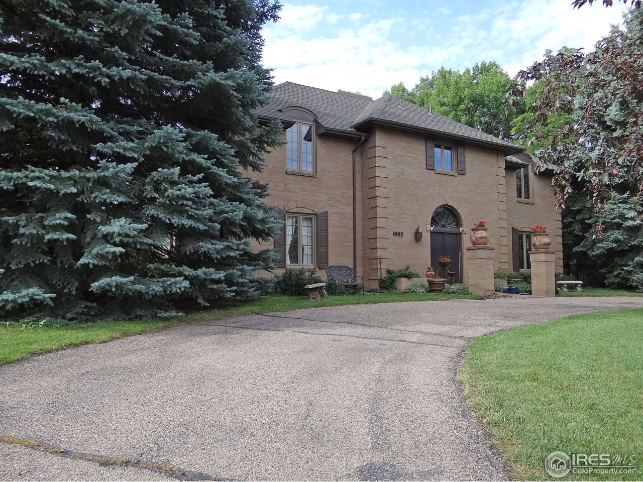 Reminiscent of a French Colonial Manor